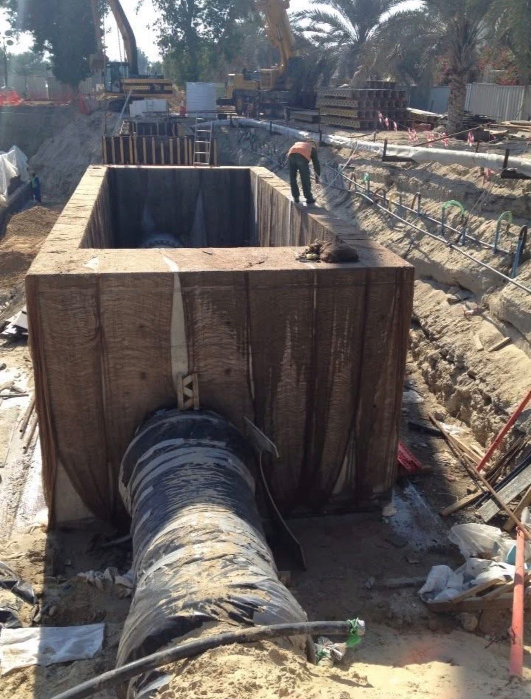Large-diameter pipeline works on a desert infrastructure project