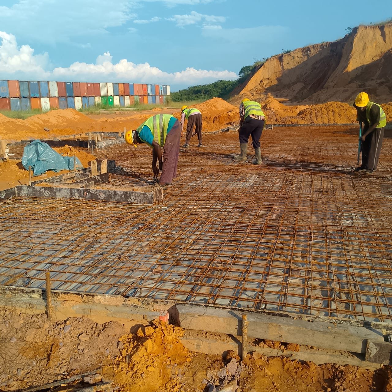 Steel fixers tying foundation rebar